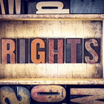 The word "Rights" written in vintage wooden letterpress type.